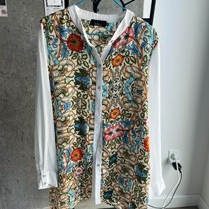 Colorful blouse with nice designs. Size 38 Europe and M in US.